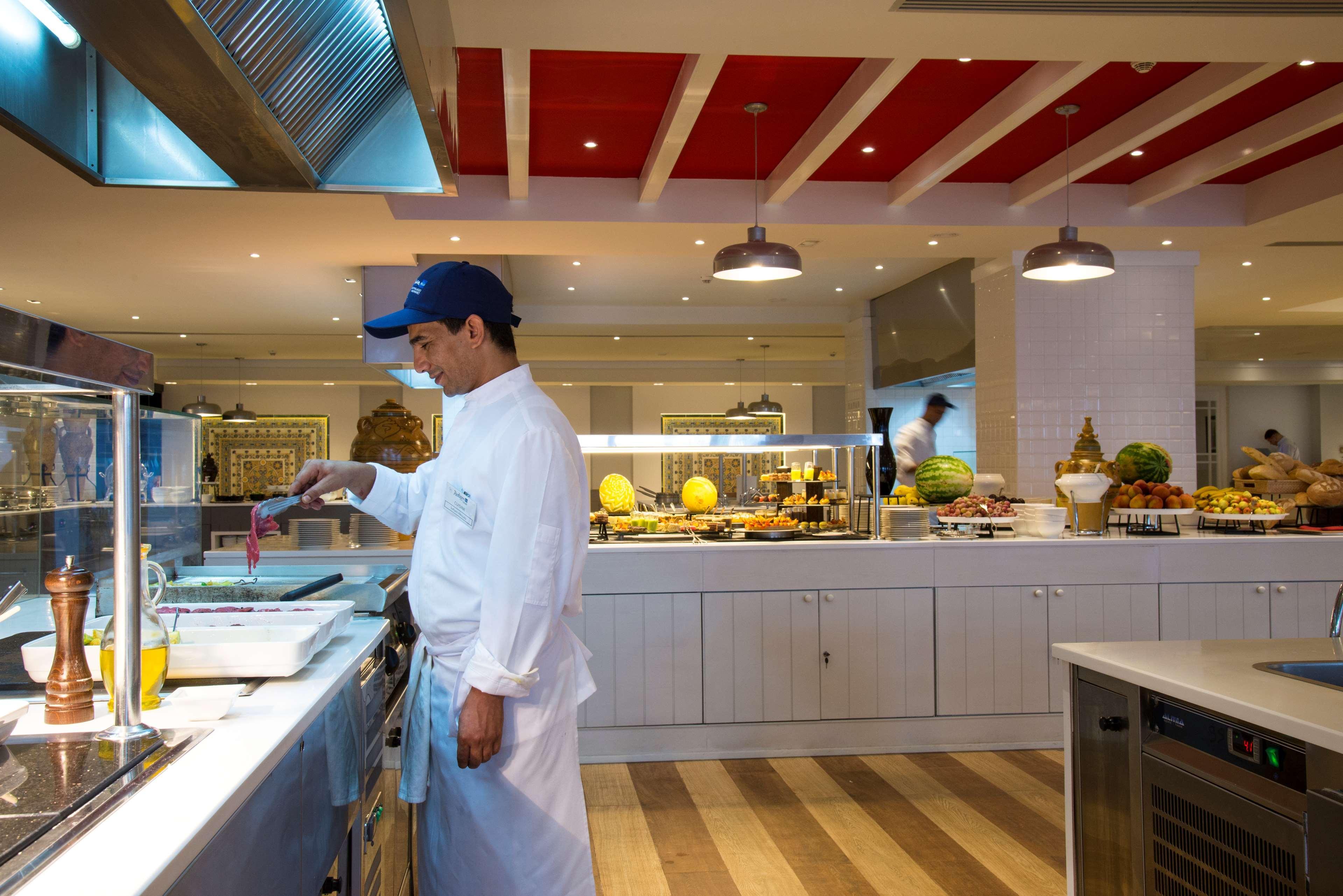 Radisson Blu Resort & Thalasso Hammamet Ngoại thất bức ảnh A cook working in a hotel kitchen